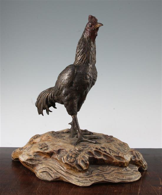 A Japanese bronze model of a cockerel, Meiji period, total height 39cm, loss to one tail feather